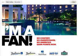 The image is an advertisement for a hotel loyalty program. It features a luxurious hotel pool area at night, with the text "I'M A FAN!" prominently displayed in large, bold letters. Below this, the text reads "NO CONTEST. NO SWEEPSTAKES. NO GIMMICKS. EARN POINTS NOW." At the bottom of the image, logos for Radisson Blu, Radisson, Park Plaza, Park Inn by Radisson, and Country Inns & Suites by Carlson are displayed.