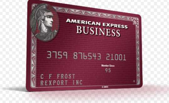 The image shows an American Express Business credit card. The card is maroon in color and features the American Express logo and the word "BUSINESS" prominently at the top. Below that, there is a card number, "3759 876543 21001," and the text "Member Since 95." The cardholder's name, "C F FROST," and the company name, "REXPORT INC," are also displayed. The card includes an image of a Roman centurion on the left side.